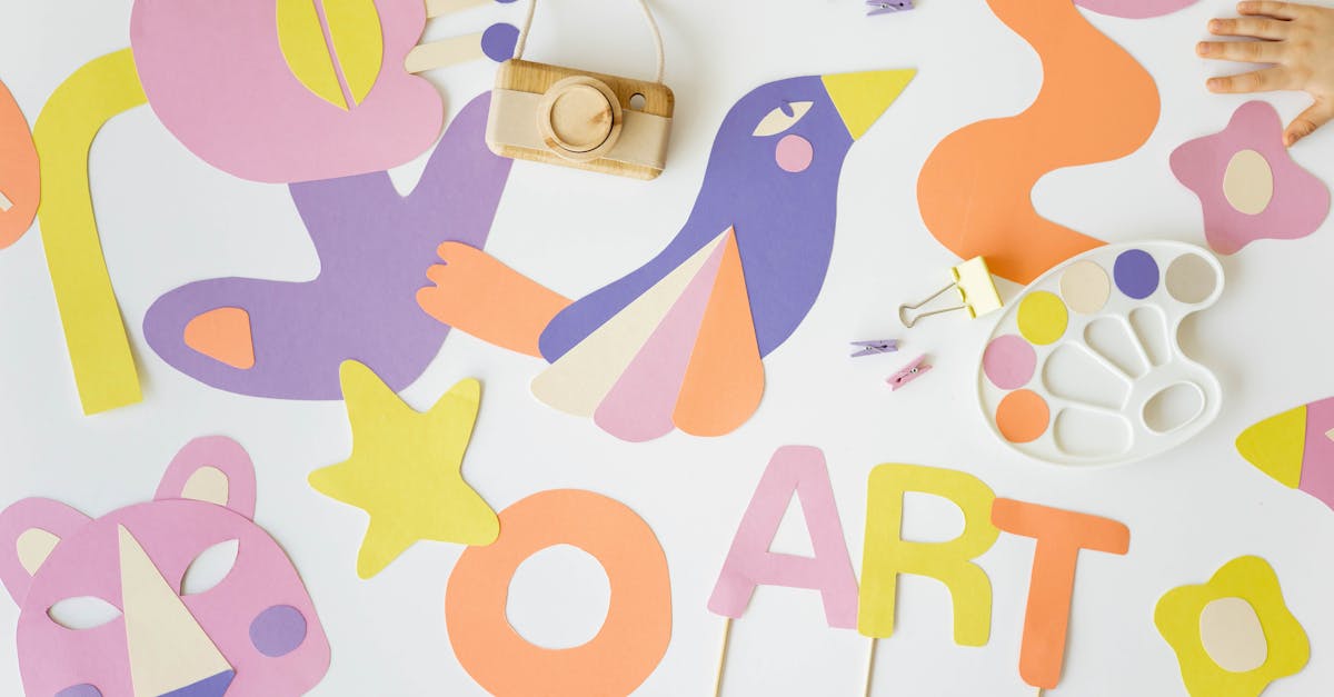 vibrant flatlay of colorful paper cutouts and art tools perfect for creative educational projects